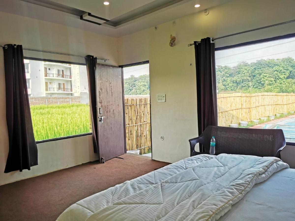 Rajaji Downtown & Cafe Resort