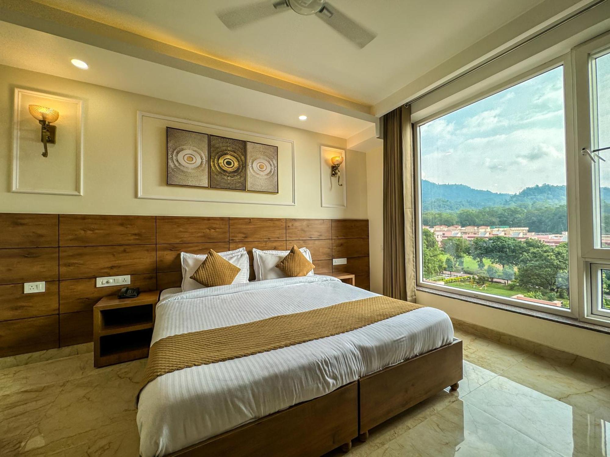Nirvana Bliss, Behind Parmarth Niketan Hotel Rishikesh